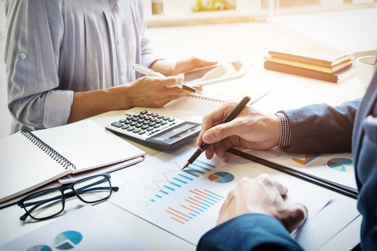 business-man-financial-inspector-secretary-making-report-calculating-checking-balance-internal-revenue-service-inspector-checking-document-audit-concept_1423-128